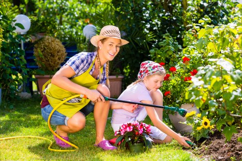 Professional landscaping crew working safely in Canary Wharf